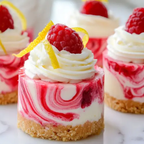 Mini Raspberry Swirl Lemon Cheesecakes