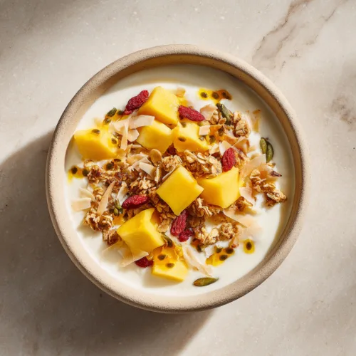 Tropical Yogurt Bowl with Mango, Passion Fruit, and Granola