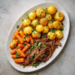 Slow Cooker Pot Roast with Baby Potatoes and Carrots