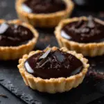 Silky Chocolate Ganache Tartlets with Almond Crust