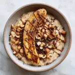 Caramelized Banana Oatmeal with Hazelnuts & Almond Butter