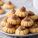 Peanut Butter Blossoms: Classic Christmas Cookies with a Sweet & Salty Twist Recipe