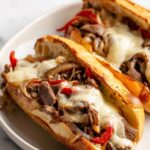 Cheesy Ribeye Steak Sandwiches with Roasted Red Peppers Recipe