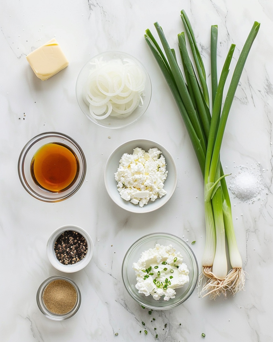 Caramelized Onion Dip Recipe 5 Single white bowl holding a generous serving of creamy chicken and herb dip, close-up angled shot emphasizing the thick, textured mix with visible shredded chicken pieces and green onion bits throughout, the rich, savory dip slightly swirled on the surface, placed on a white marble background, styled like an individual food blog serving, natural lighting highlighting the smooth and chunky consistency, photo taken with an iphone --ar 4:5 --v 7