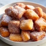 Crispy Churro Bites with Cinnamon Sugar Coating and Dipping Sauces Recipe