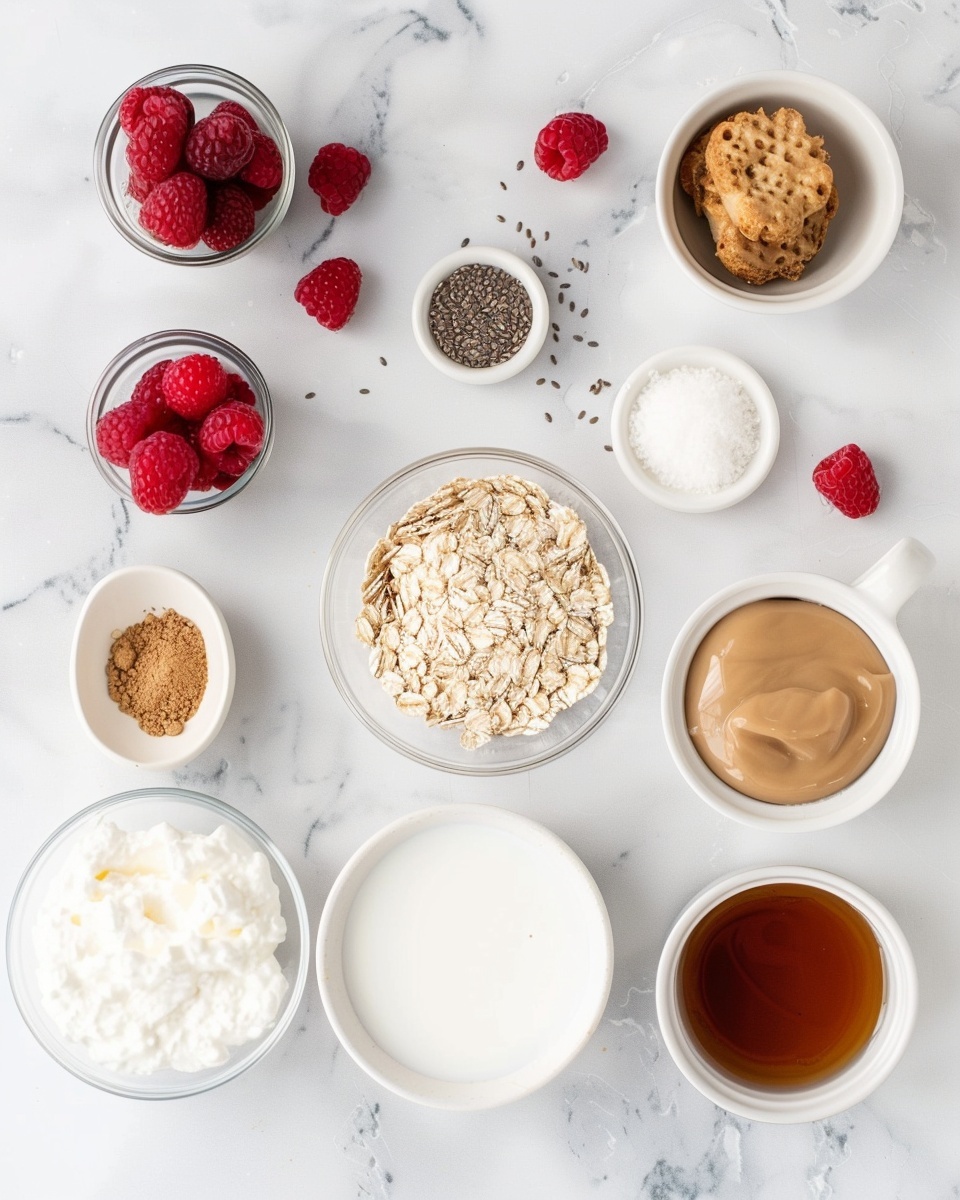 Easy Biscoff Overnight Oats Recipe 5 Single white ramekin containing a single serving of layered dessert featuring creamy oatmeal swirled with vibrant red berry compote, topped with a smooth layer of caramel spread and sprinkled with crunchy biscuit crumbs, close-up angle capturing the rich textures and color contrasts of the oat mixture, berry swirl, and caramel layer, placed on a white marble surface under soft natural lighting, styled like an elegant individual portion from a food blog, photo taken with an iphone --ar 4:5 --v 7