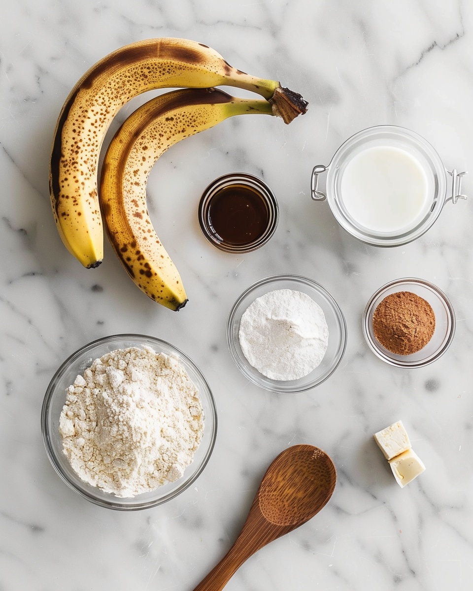 Fluffy Banana Bread Donuts Recipe 5 Single white plate featuring one sugar-coated donut with a visible bite revealing the soft, fluffy interior texture, close-up shot highlighting the cinnamon sugar crust and airy crumb inside, natural light softly illuminating the surface, white marble background, styled as an inviting individual serving from a food blog, photo taken with an iphone --ar 4:5 --v 7