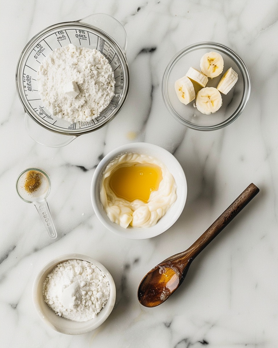 Vegan Banana Pudding Recipe 5 Single white glass jar containing one serving of layered banana custard dessert, close-up angled view revealing creamy yellow custard with a visible layer of whipped cream and soft cake or biscuit crumbs in the middle, topped with thinly sliced almonds, woman’s hand holding a spoon lifting a luscious, smooth scoop from the jar, placed on white marble surface under natural lighting, styled food blog presentation photo taken with an iphone --ar 4:5 --v 7