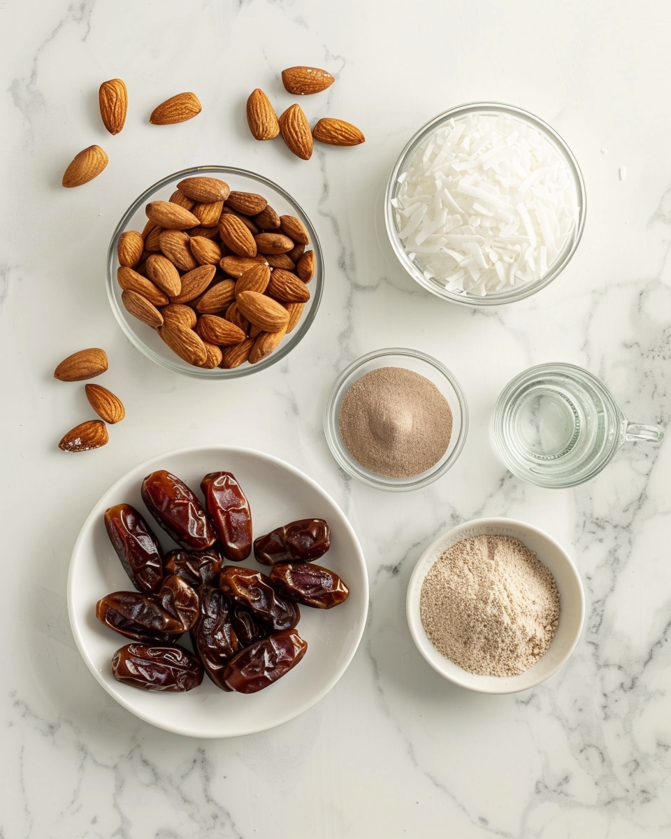 No-Bake Coconut Energy Balls Recipe 5 Single white plate with one energy ball coated in shredded coconut, close-up angled view emphasizing the textured coconut flakes and the smooth, nut-studded interior of the energy ball exposed by a slight bite, natural lighting enhancing the contrast between the white coconut and dark rich mixture inside, set on a white marble surface, styled as an inviting individual serving from a food blog, photo taken with an iphone --ar 4:5 --v 7