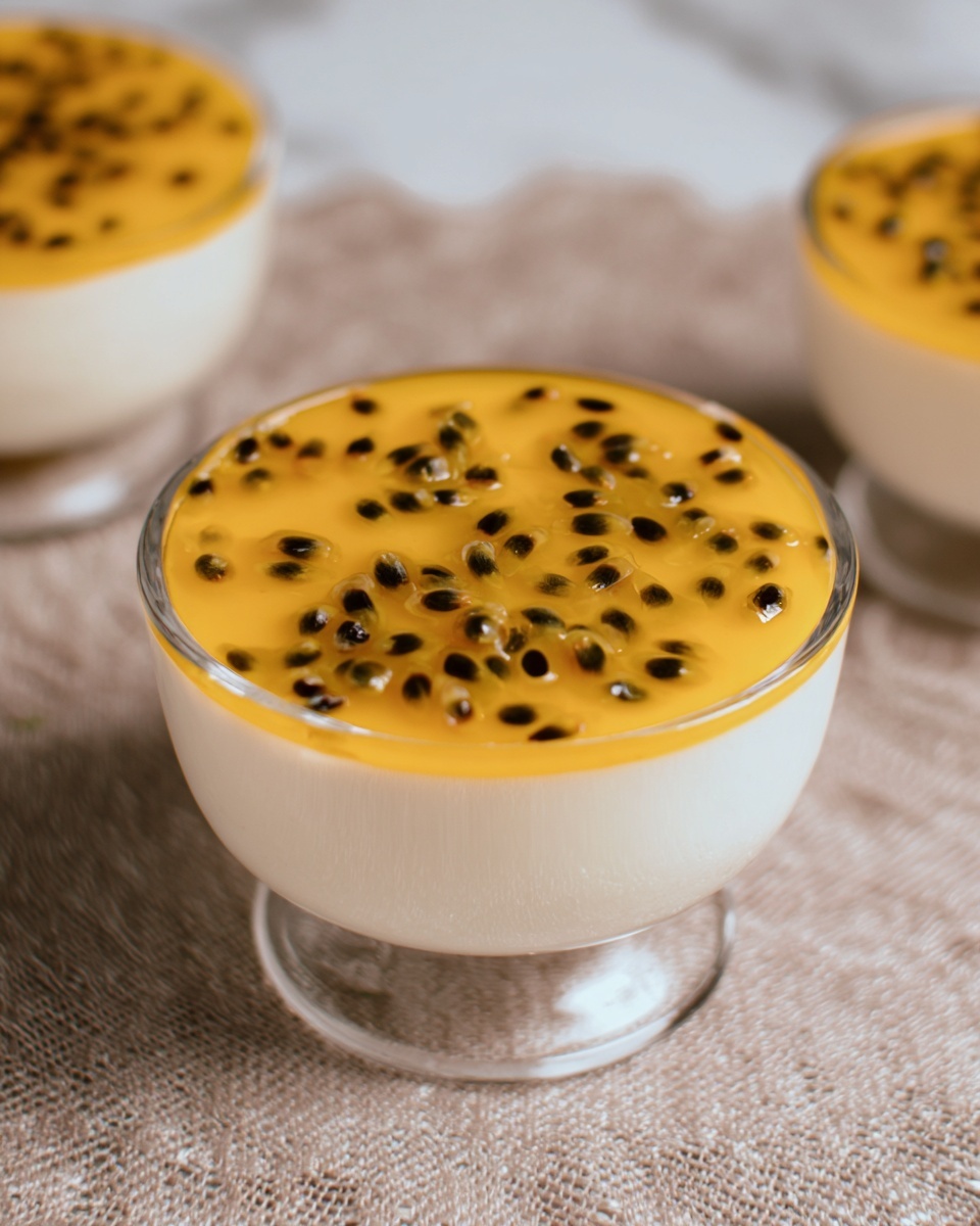 Three large white glass dessert bowls filled with creamy passion fruit mousse topped evenly with a vibrant layer of passion fruit pulp and scattered black seeds, arranged together on a rustic beige fabric surface, whole dishes shown with smooth textures and glossy finish, professional food styling with natural light on white marble background, photo taken with an iphone --ar 4:5 --v 7