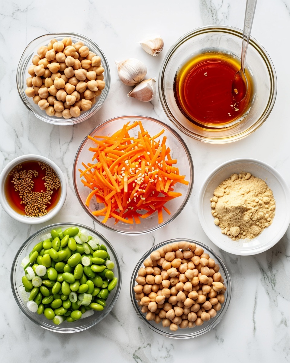 Single white bowl containing a vibrant serving of chickpea and edamame salad with thin strips of red bell pepper and carrot, tossed in herb and chili seasoning, close-up angle highlighting the glistening, textured beans and fresh herbs sprinkled with sesame seeds, placed on a white marble surface, natural lighting emphasizing the colorful contrast and freshness, intimate plated serving photo taken with an iphone --ar 4:5 --v 7