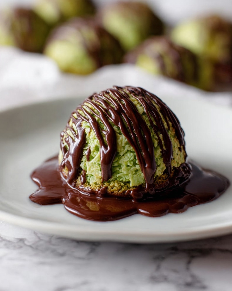 A pristine white plate filled with a generous mound of round coconut macaroons, each fully coated in glossy dark chocolate along the bottom and artfully drizzled with more dark chocolate on top, showcasing their dense shredded coconut texture and golden toasted edges, all arranged neatly to emphasize their uniform dome shape and rich contrast of colors, photographed from a 3/4 angle on a white marble surface with natural lighting, styled like a hero shot from a food magazine, photo taken with an iphone --ar 4:5 --v 7
